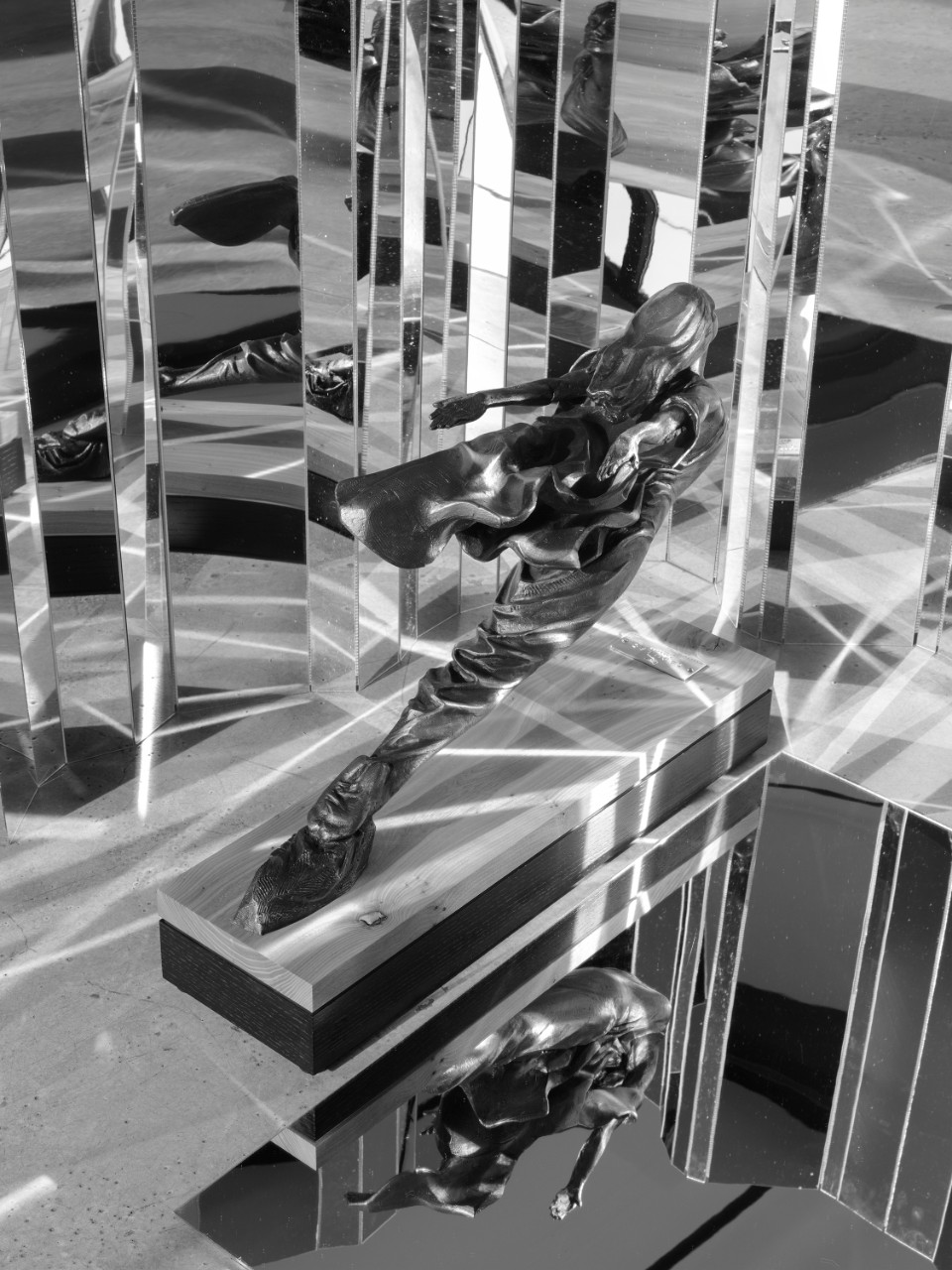 Artful Imagery: Cadillac’s Historic Goddess Viewed Through the Lens of Celebrated Photographers